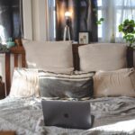 how to clean a mattress with baking soda, a vacuum, and fresh bedding
