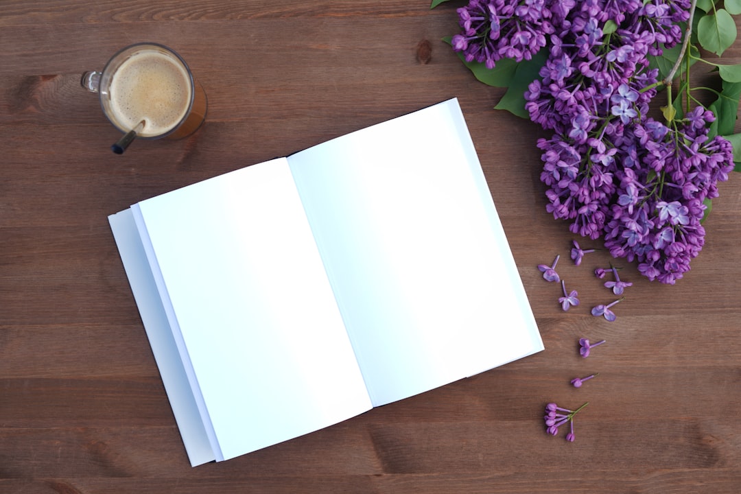 Building a Reading Habit cover image showing an open book, notebook, and tea on a quiet desk